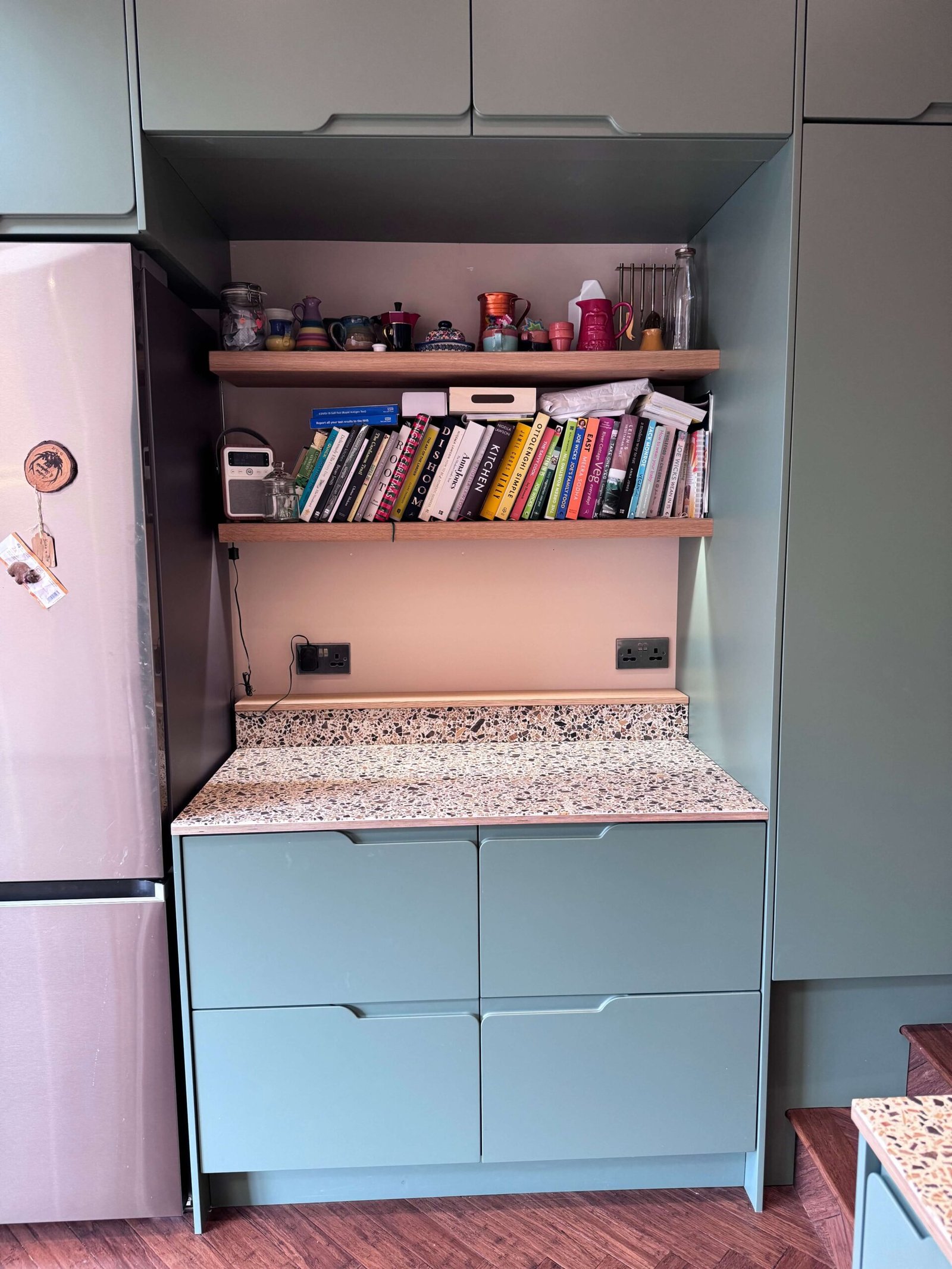 mint-green-kitchen-cupboards-with-shelf